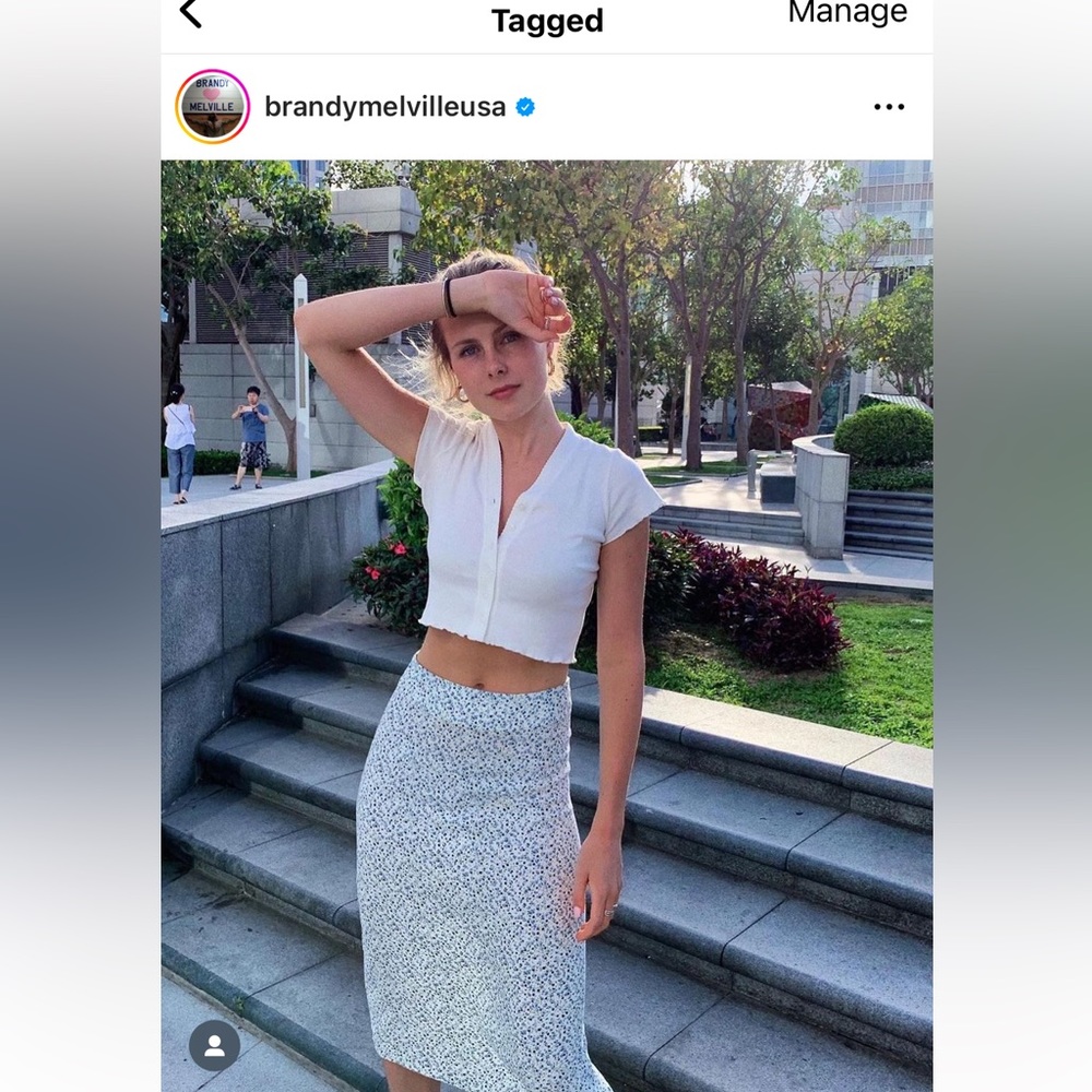 Brandy Melville Midi Floral Skirt - wearing in photo